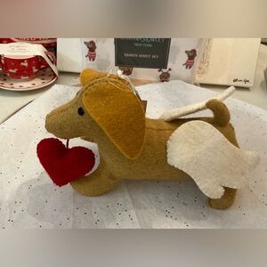 Adorable dachshund valentine figure with angel wings